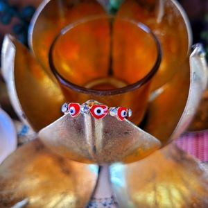 Gold plated evil eye (in red) Size 10. Available in multiple sizes